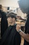 Paul Serville combs client's hair at Servilles academy